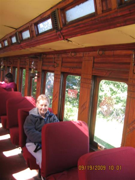 Liz Keating inside Sand River Railroad car