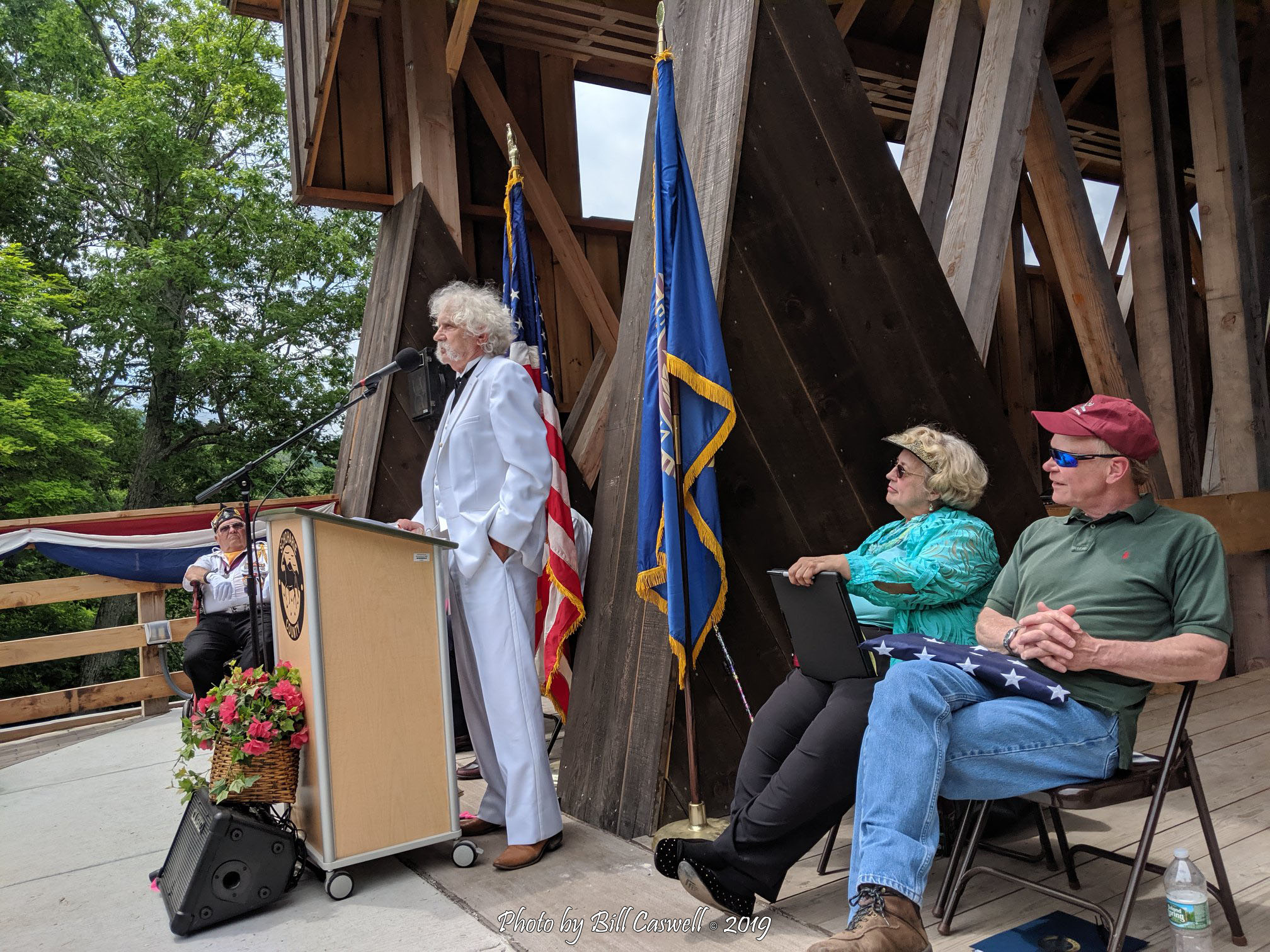 Mark Twain speaks to the crowd